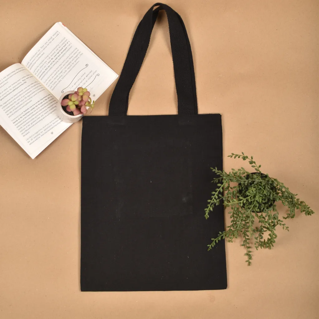 Black canvas tote bag with heart embroidery