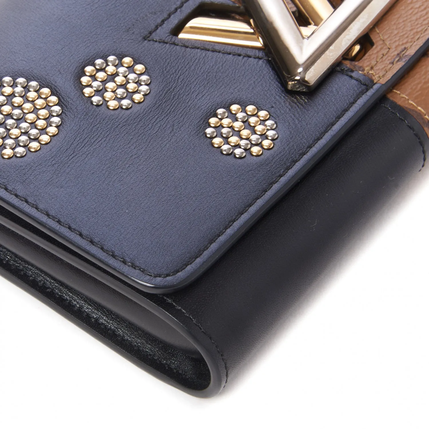 LOUIS VUITTON REVERSE MONOGRAM STUDDED NIGHT LIGHTS TWIST CALFSKIN CHAIN WALLET