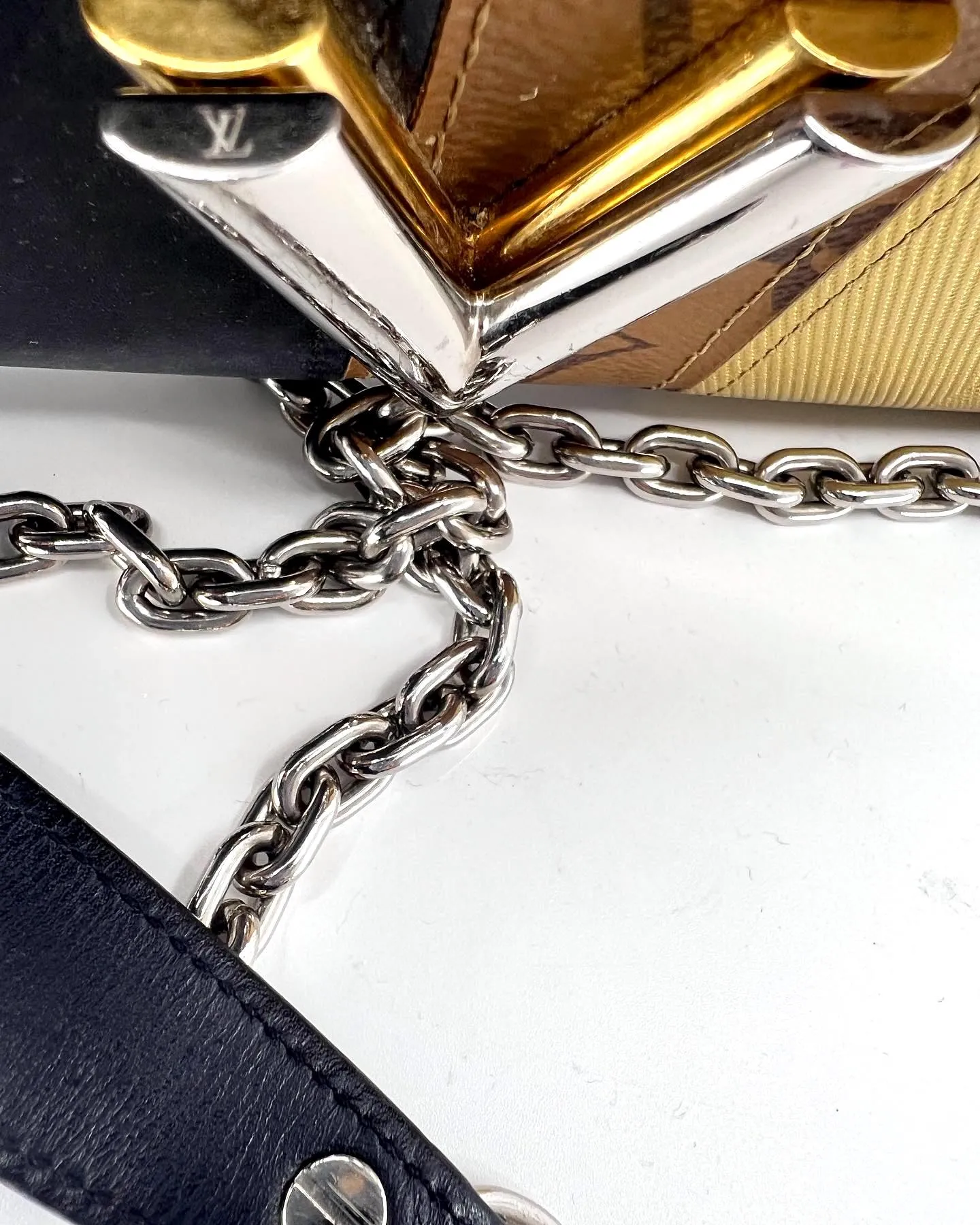 LOUIS VUITTON REVERSE MONOGRAM STUDDED NIGHT LIGHTS TWIST CALFSKIN CHAIN WALLET