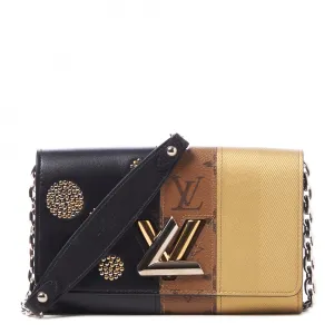 LOUIS VUITTON REVERSE MONOGRAM STUDDED NIGHT LIGHTS TWIST CALFSKIN CHAIN WALLET