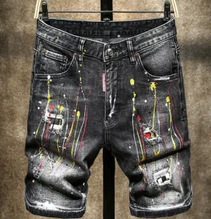 Yellow-painted distressed denim shorts